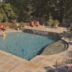 Amazing Dual-tier Pool Deck Done in Flagstone