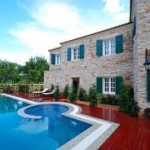Marble Tile and Cherry Hard Wood Floor Pool Deck